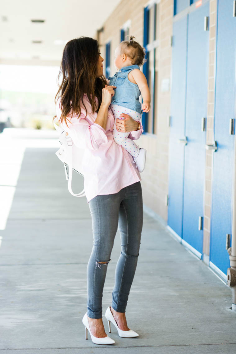 White pumps, grey jeans, pink top