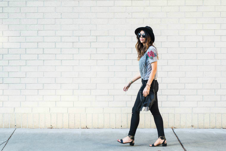 Hat, sandals, distressed jeans, fringe top