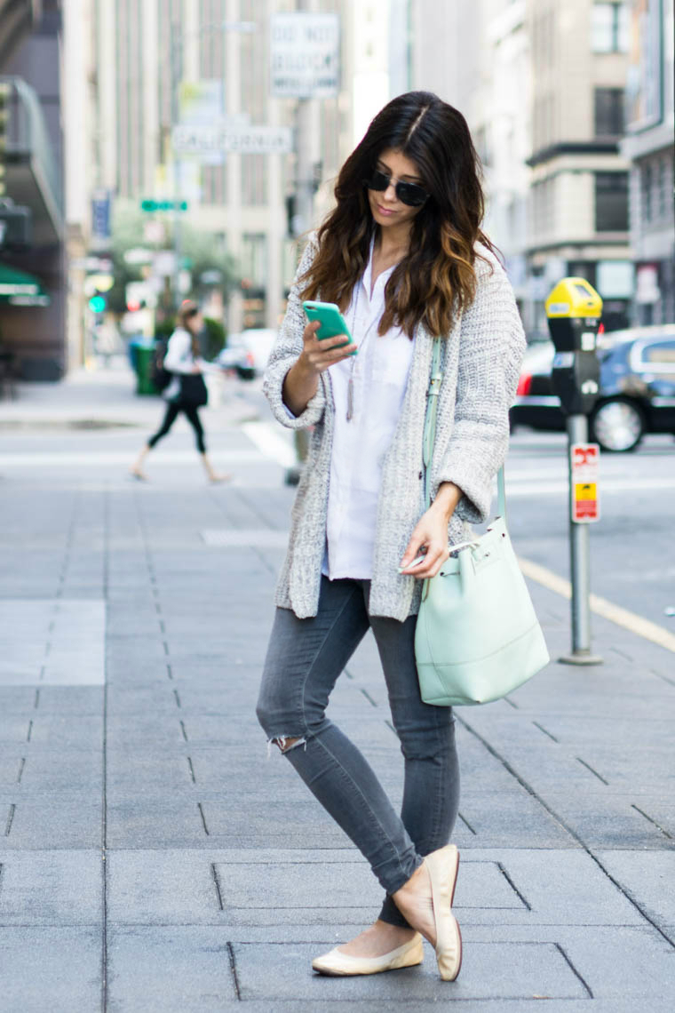 grey jeans, nude flats, mint bag