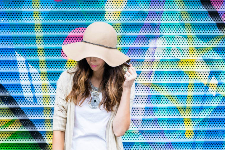 floppy hat, sliver necklace