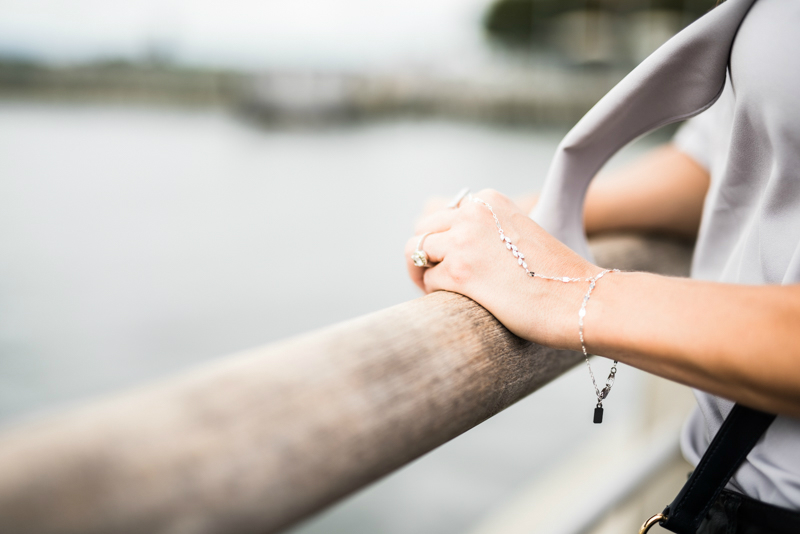 Sliver hand chain - Grey Bow Tie Top styled by popular San Francisco fashion blogger, The Girl in The Yellow Dress