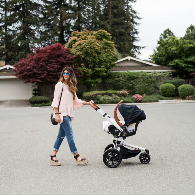 Spring Shoe Trends featured by top US fashion blog The Girl in the Yellow Dress; Image of a woman wearing Gibson ruffle top, AG jeans, Marc Fisher wedges, Cluse watch and Ray-Ban sunglasses.