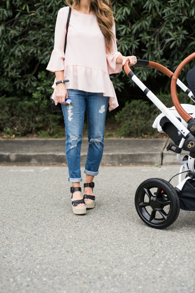 Spring Shoe Trends featured by top US fashion blog The Girl in the Yellow Dress; Image of a woman wearing Gibson ruffle top, AG jeans, Marc Fisher wedges, Cluse watch and Ray-Ban sunglasses.