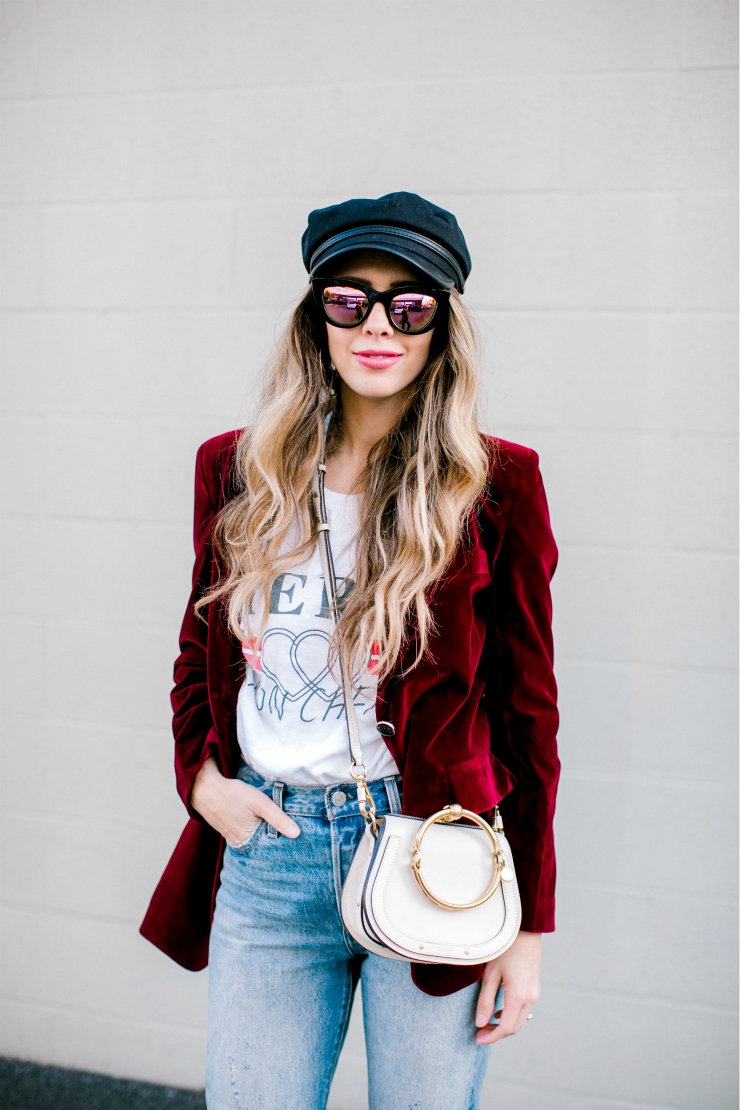 Cute Valentines Day Tops featured by top US fashion blog, The Girl in the Yellow Dress: image of a woman wearing a red Chicwish blazer, a TOPSHOP graphic tee, Levi’s mom jeans, Chloe bag, Brixton fiddler cap, Free People sunglasses and Jeffrey Campbell booties