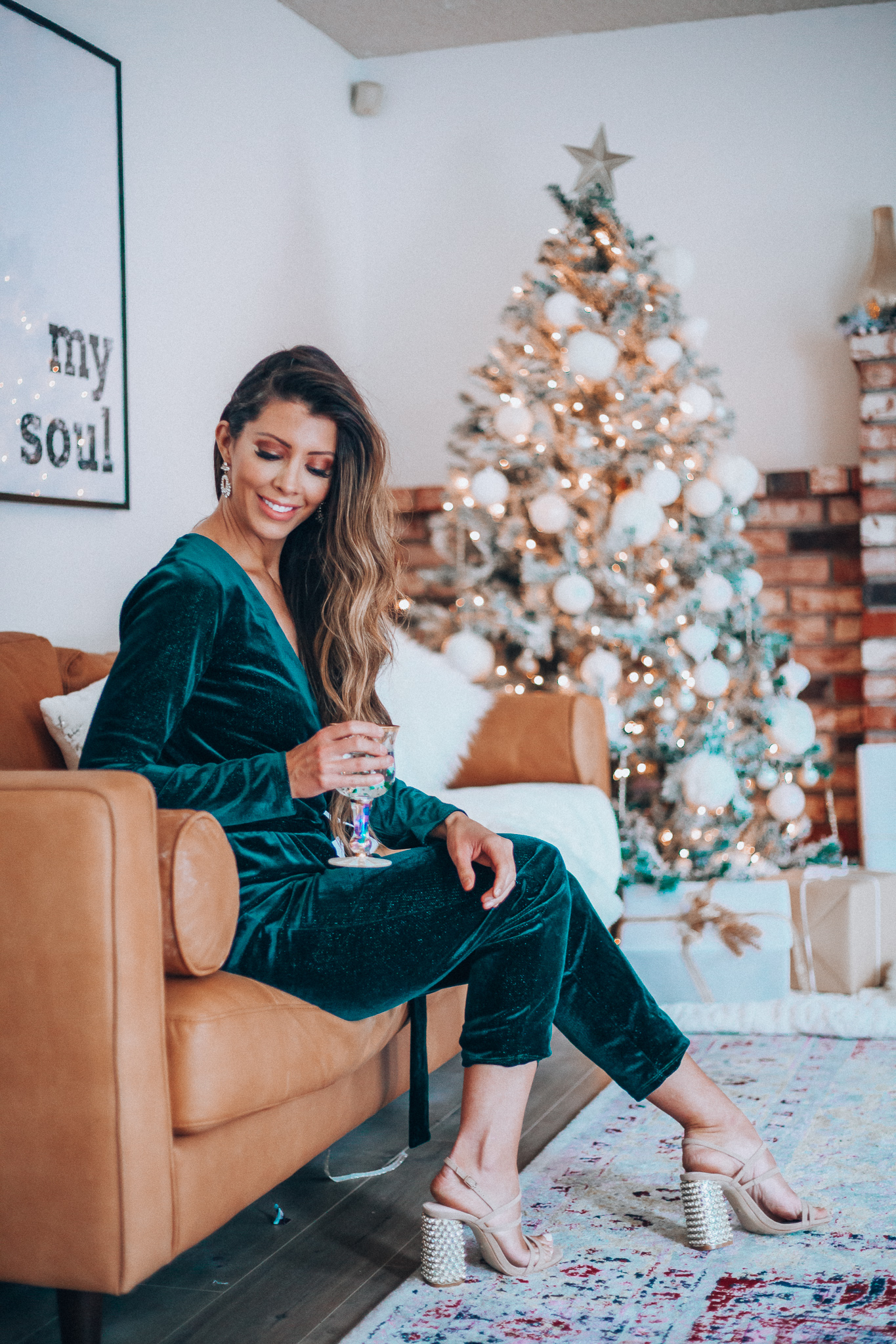 The Perfect Holiday Party Looks featured by top San Francisco fashion blog, The Girl in the Yellow Dress: image of a woman wearing a Hart Suede Jumpsuit and Marmont Heels