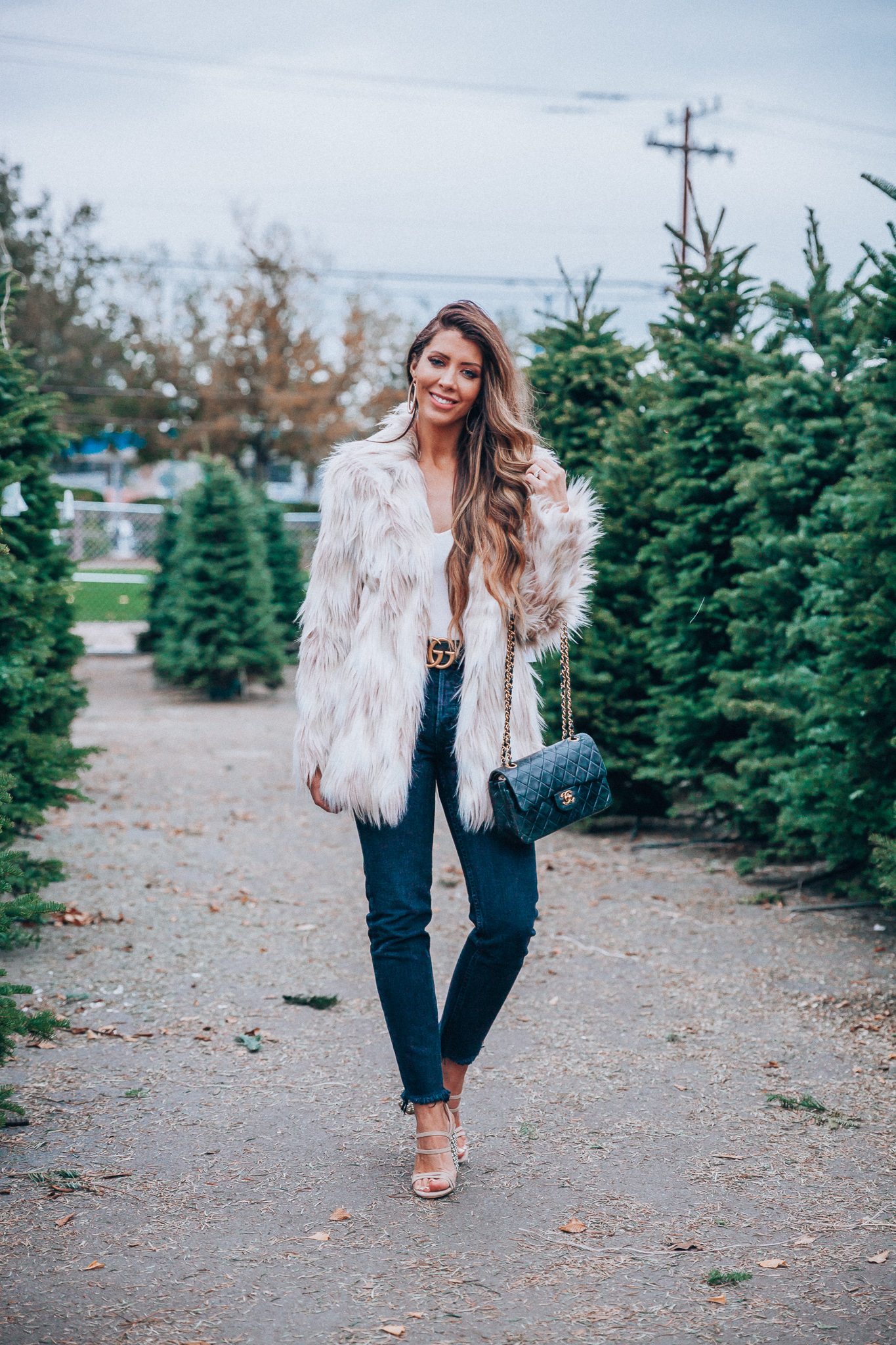 Revolve | Christmas | Green Monday Sales + My Favorite Faux Fur Coat featured by top San Francisco fashion blog The Girl in the Yellow Dress