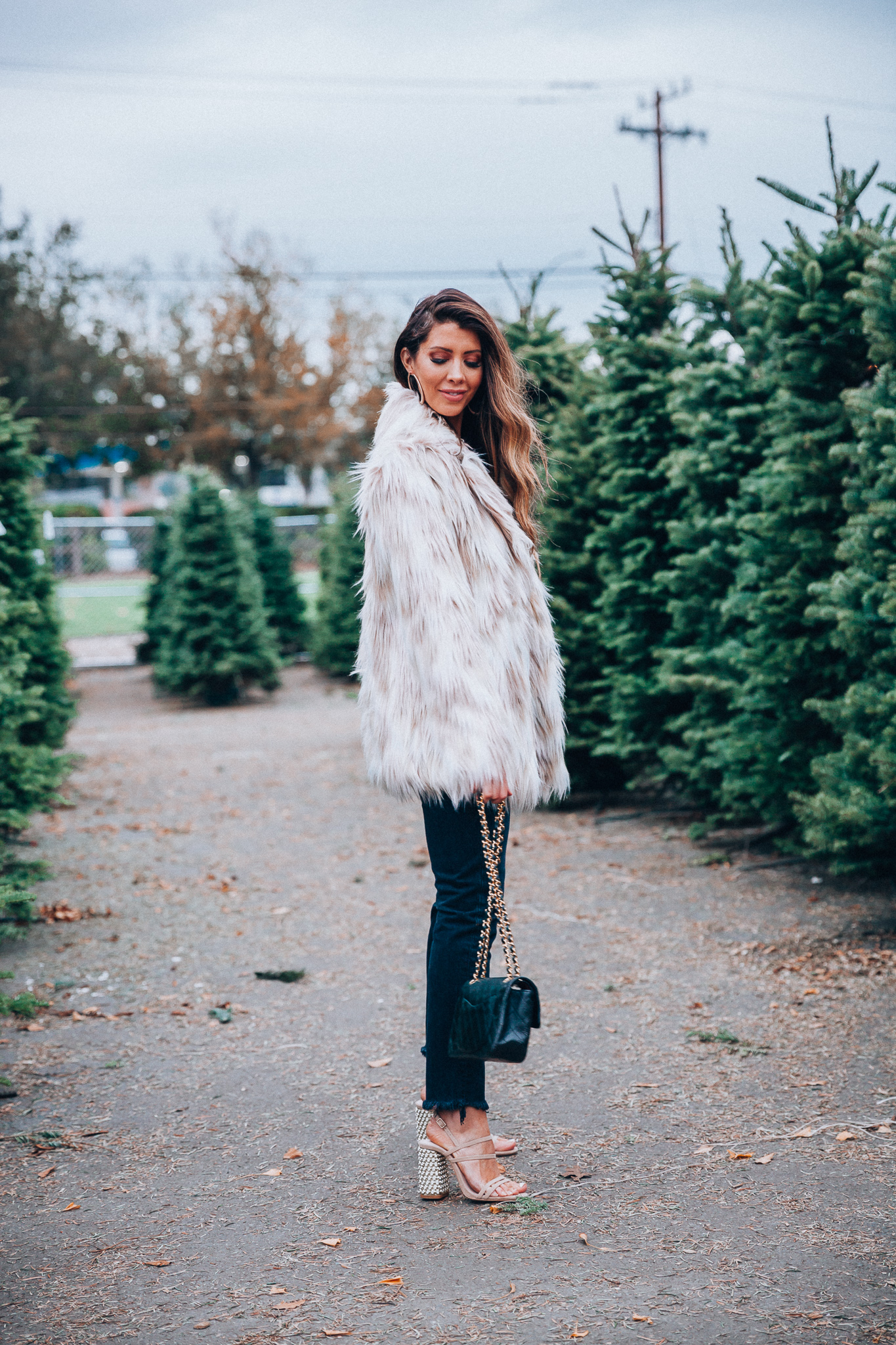 Revolve | Christmas | Green Monday Sales + My Favorite Faux Fur Coat featured by top San Francisco fashion blog The Girl in the Yellow Dress