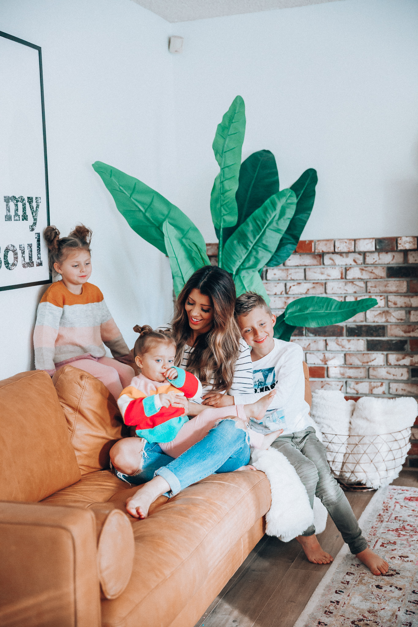 Family Update featured by top US lifestyle blog The Girl in the Yellow Dress; Image of a woman with her kids wearing BP striped tee and Levi's.