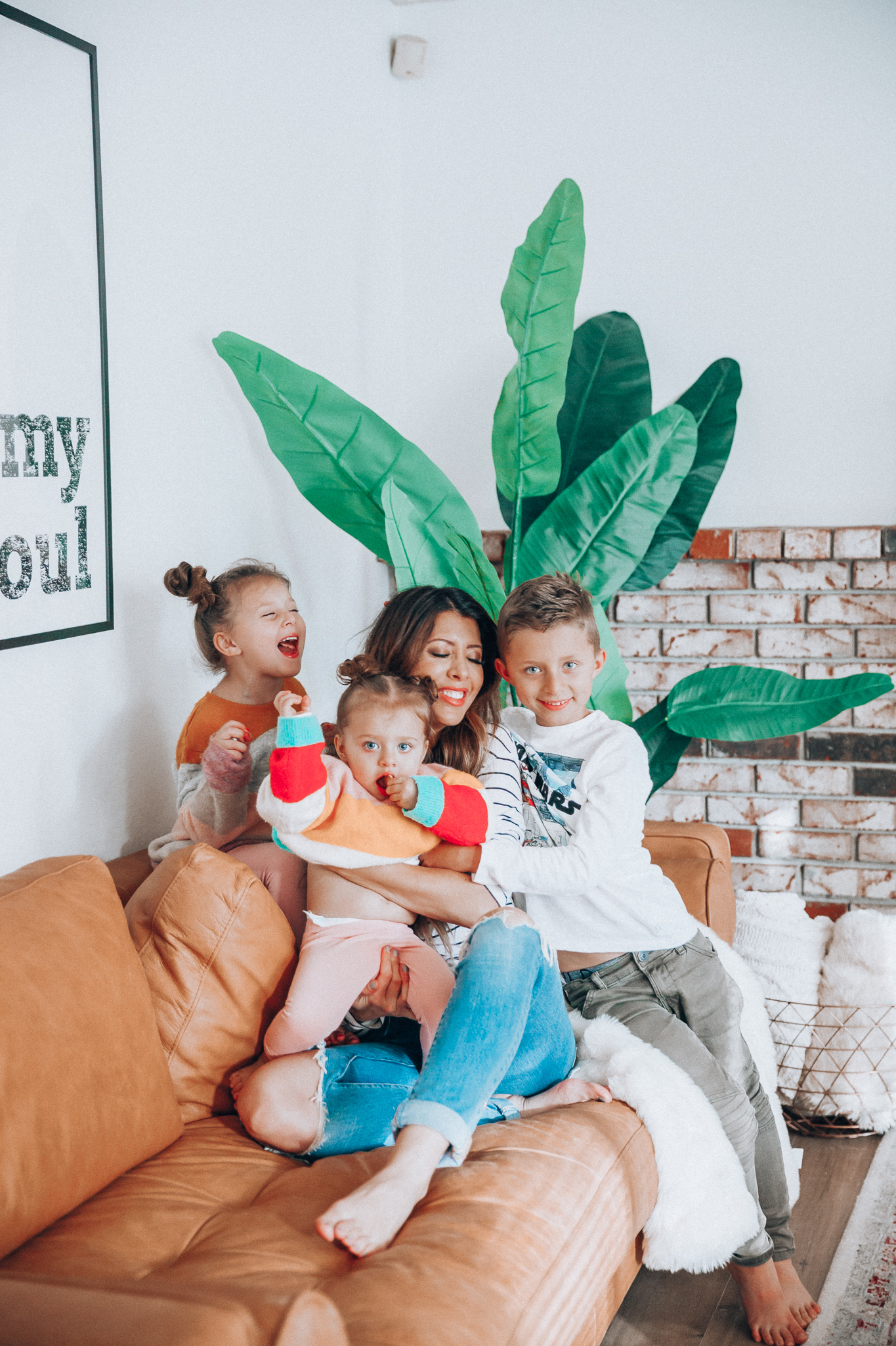 Family Update featured by top US lifestyle blog The Girl in the Yellow Dress; Image of a woman with her kids wearing BP striped tee and Levi's.