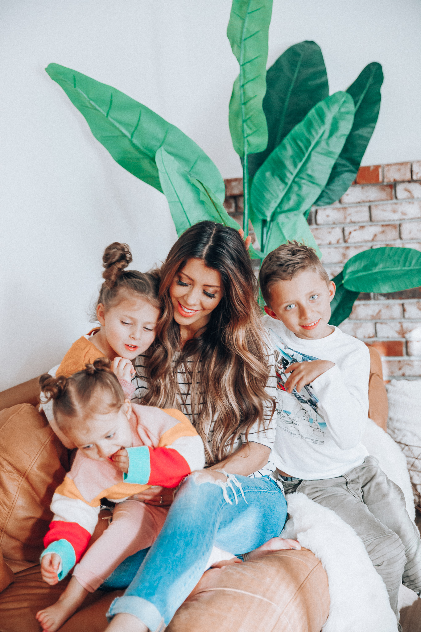 Family Update featured by top US lifestyle blog The Girl in the Yellow Dress; Image of a woman with her kids wearing BP striped tee and Levi's.