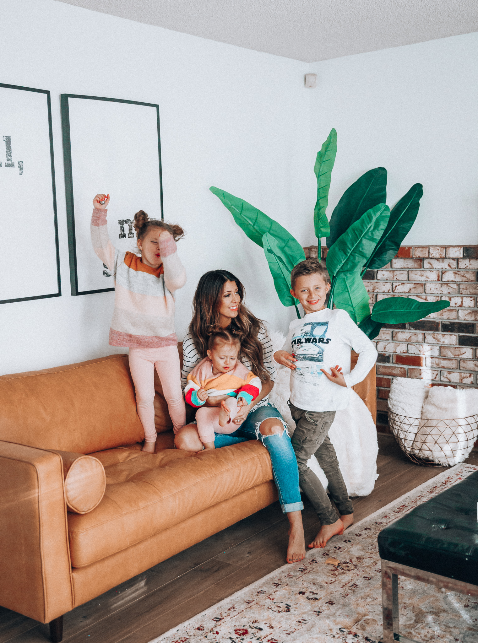 Family Update featured by top US lifestyle blog The Girl in the Yellow Dress; Image of a woman with her kids wearing BP striped tee and Levi's.