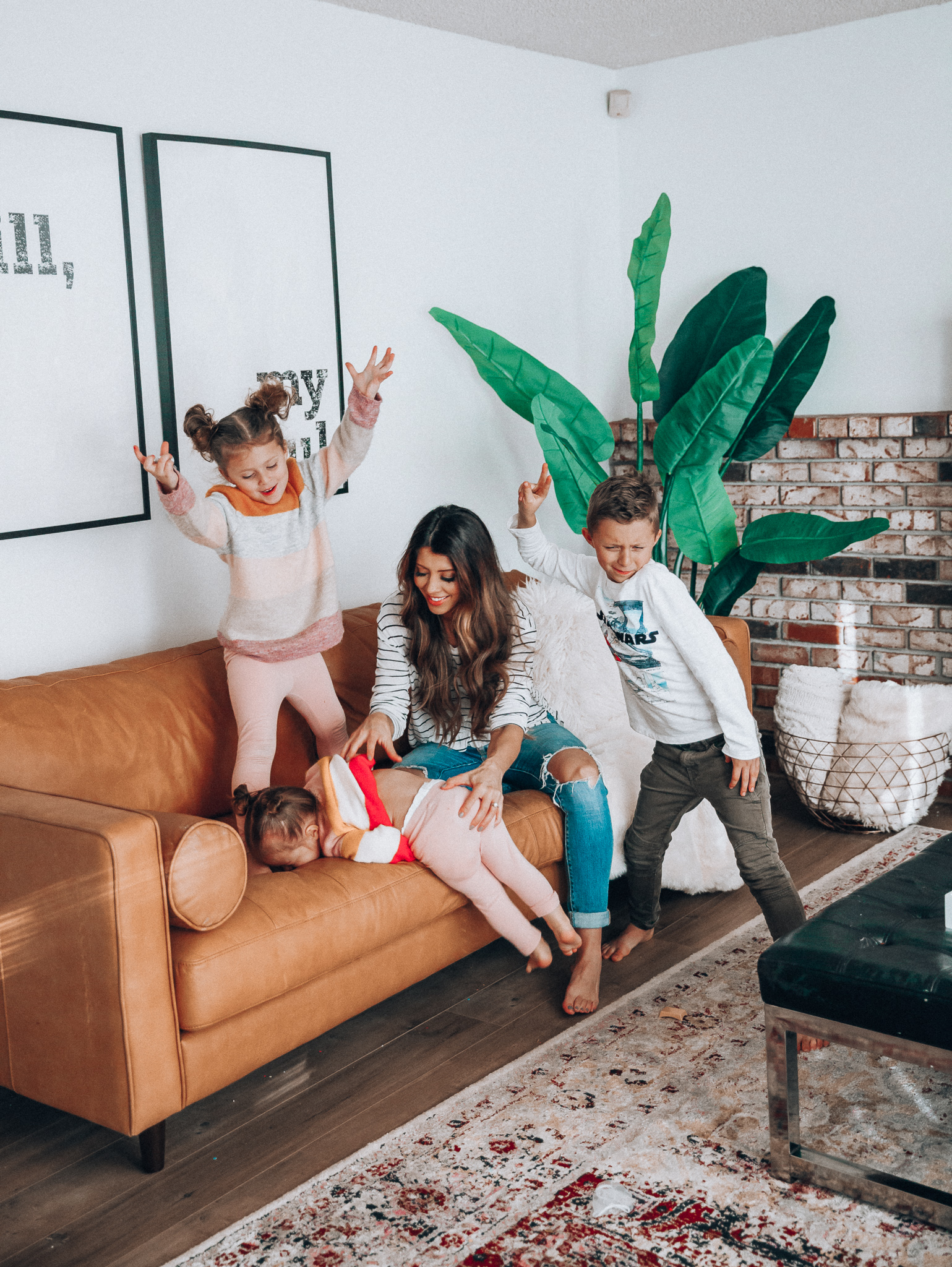 Family Update featured by top US lifestyle blog The Girl in the Yellow Dress; Image of a woman with her kids wearing BP striped tee and Levi's.