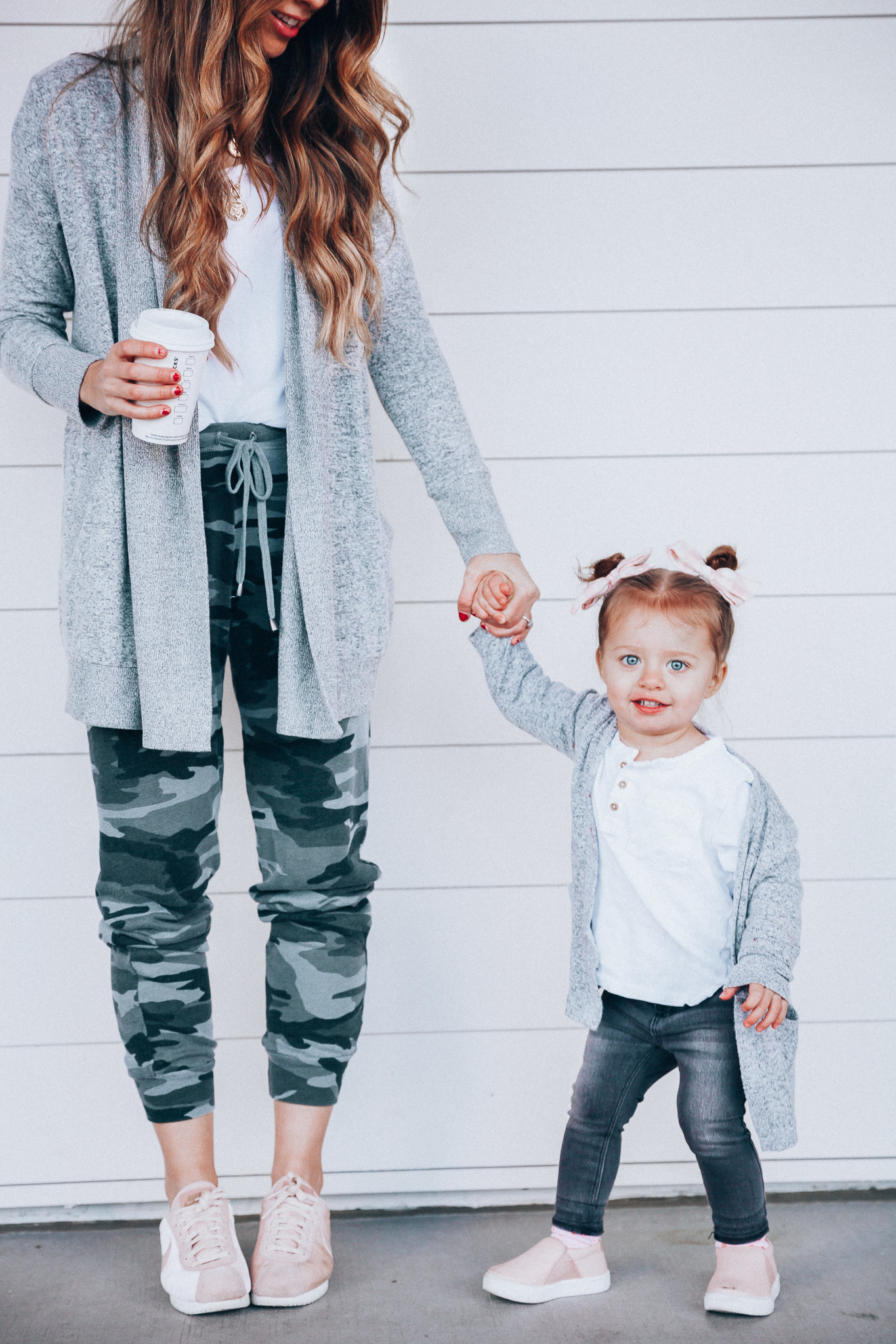 Camo Joggers featured by top US fashion blog The Girl in the Yellow Dress; Image of a woman wearing Nordstrom joggers, BP white tee and Nike shoes.