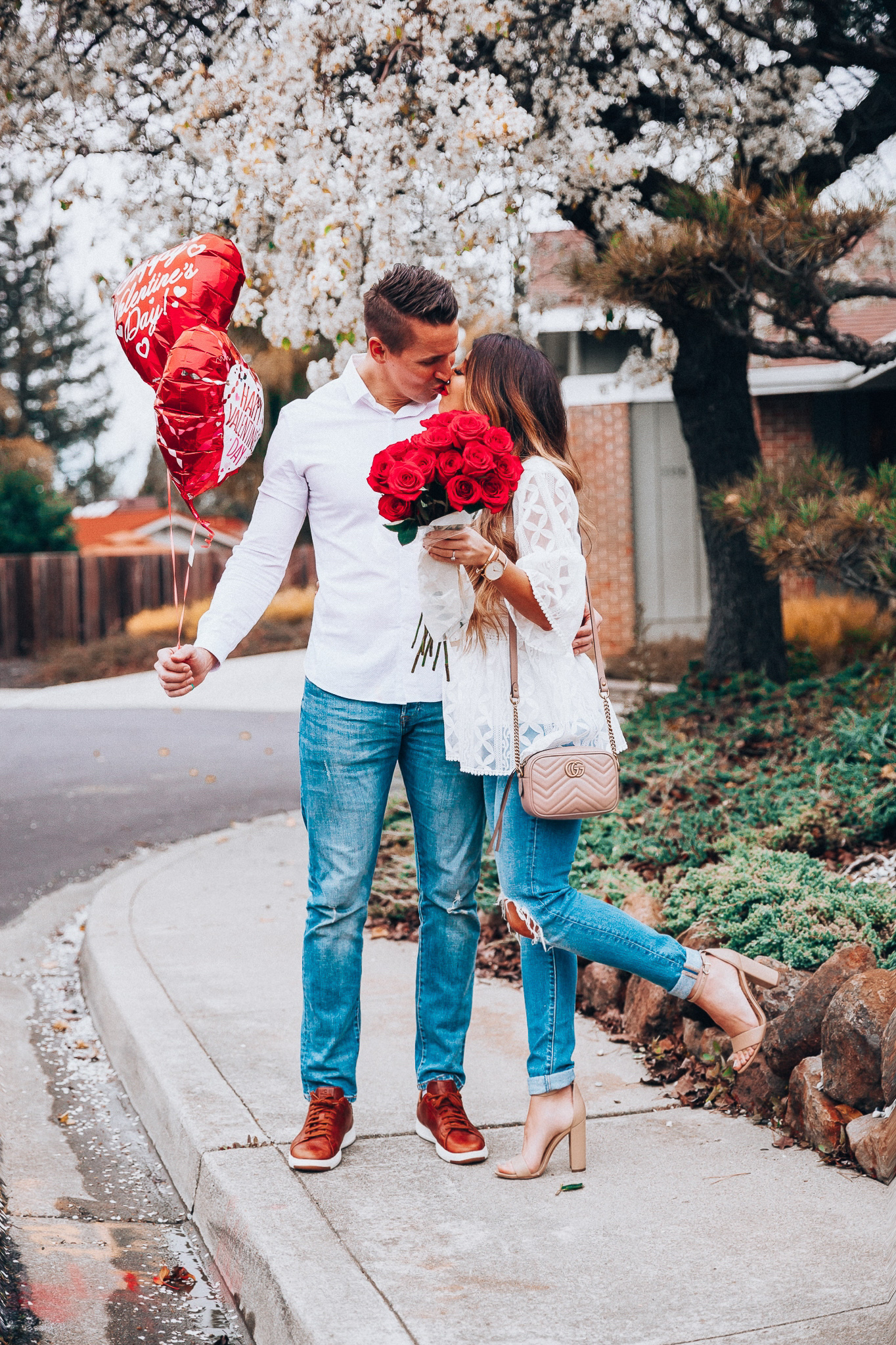 Valentine's Day Gifts for Him and Her by popular San Francisco life and style blog, The Girl in the Yellow Dress: image of a man and woman wearing a Chic Wish Summer Lovin' Embroidered Dolly Top, ShopBop Levi's 721 High Rise Distressed Skinny Jeans, Nordstrom Sam Edelman Yaro Ankle Strap Sandal, Nordstrom Gucci Matelassé Leather Shoulder Bag, Nordstrom Topman Classic Fit Button-Up Shirt, Old Navy Slim Built-In Flex Distressed Jeans For Men, and Nordstrom Cole Haan GrandPro Low Top Sneaker.