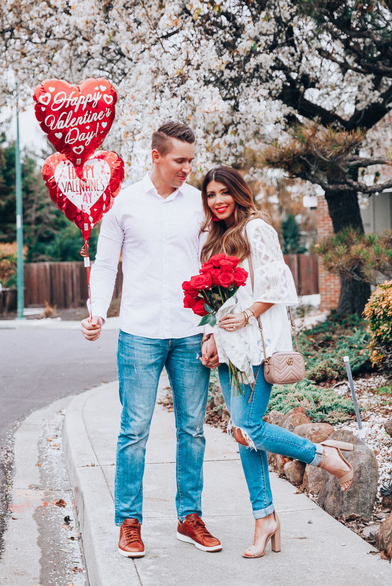 Valentine's Day Gifts for Him and Her by popular San Francisco life and style blog, The Girl in the Yellow Dress: image of a man and woman wearing a Chic Wish Summer Lovin' Embroidered Dolly Top, ShopBop Levi's 721 High Rise Distressed Skinny Jeans, Nordstrom Sam Edelman Yaro Ankle Strap Sandal, Nordstrom Gucci Matelassé Leather Shoulder Bag, Nordstrom Topman Classic Fit Button-Up Shirt, Old Navy Slim Built-In Flex Distressed Jeans For Men, and Nordstrom Cole Haan GrandPro Low Top Sneaker.