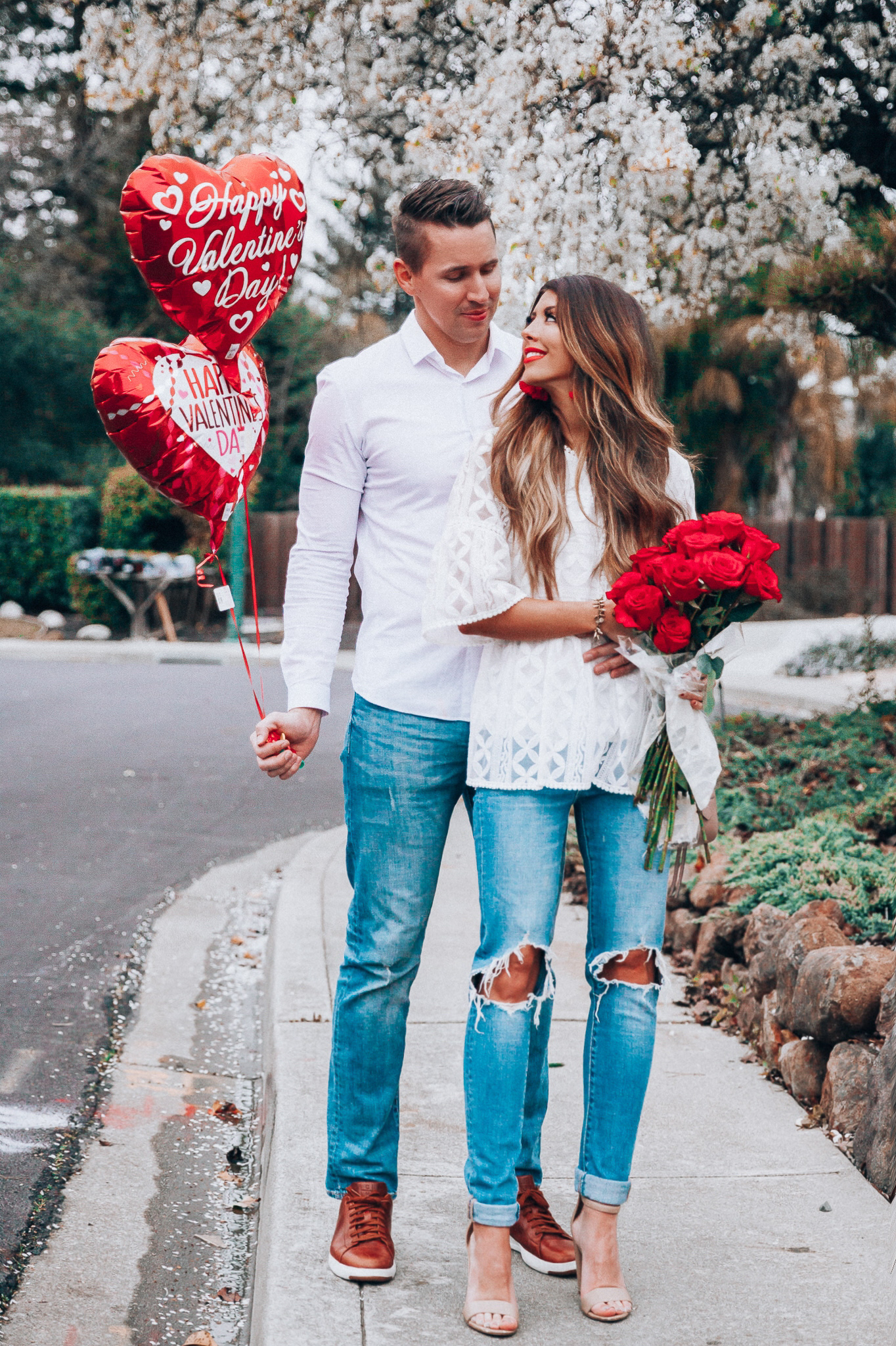 Valentine's Day Gifts for Him and Her by popular San Francisco life and style blog, The Girl in the Yellow Dress: image of a man and woman wearing a Chic Wish Summer Lovin' Embroidered Dolly Top, ShopBop Levi's 721 High Rise Distressed Skinny Jeans, Nordstrom Sam Edelman Yaro Ankle Strap Sandal, Nordstrom Gucci Matelassé Leather Shoulder Bag, Nordstrom Topman Classic Fit Button-Up Shirt, Old Navy Slim Built-In Flex Distressed Jeans For Men, and Nordstrom Cole Haan GrandPro Low Top Sneaker.