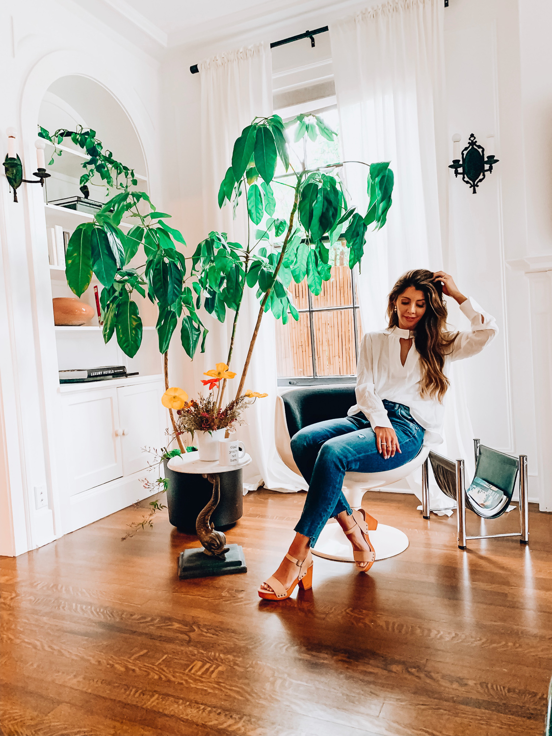 Cute Summer Sandals featured by top US fashion blog The Girl in the Yellow Dress; Image of a woman wearing Evereve wooden sandals.