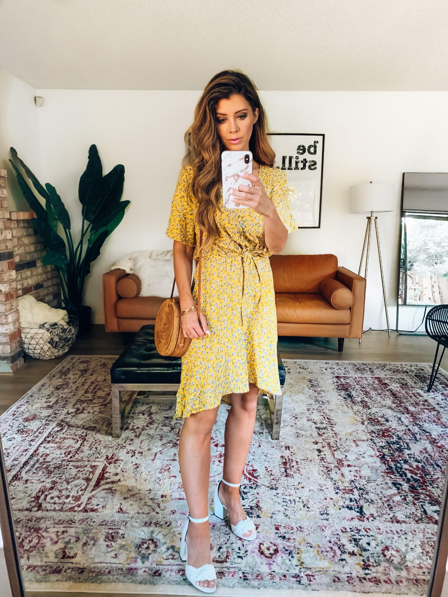 ShopBop Sale featured by top US fashion blog The Girl in the Yellow Dress; Image of a woman wearing Nordstrom yellow dress, Rebecca Minkoff heels and Amazon basket bag.