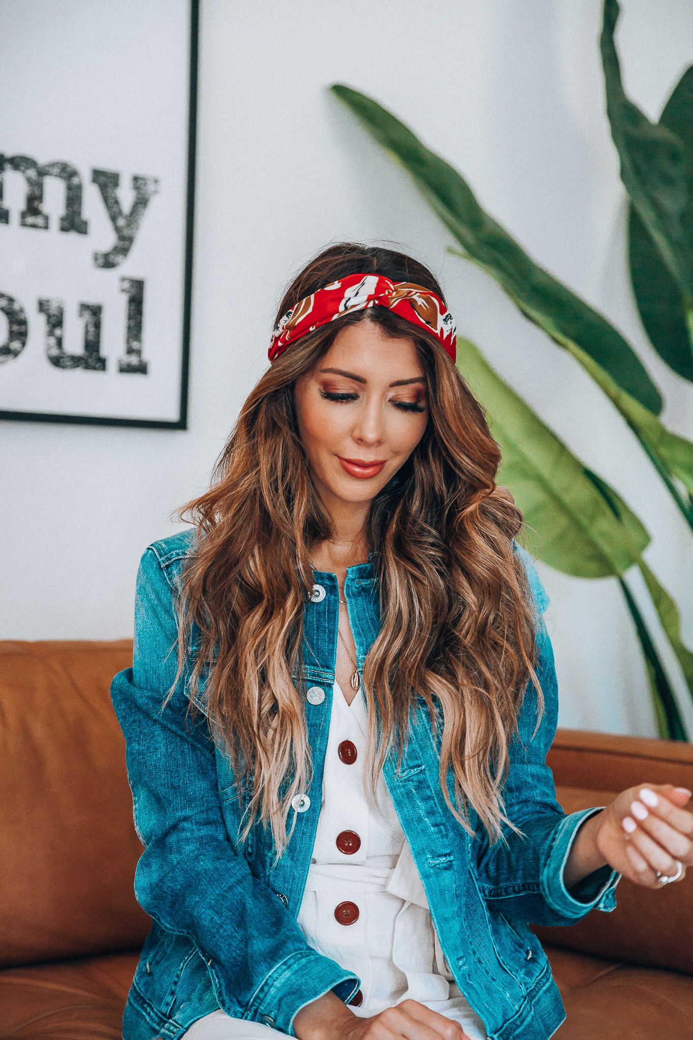 Hair Accessories for Long Hair featured by top US fashion blog The Girl in the Yellow Dress; Image of a woman wearing a denim jacket.