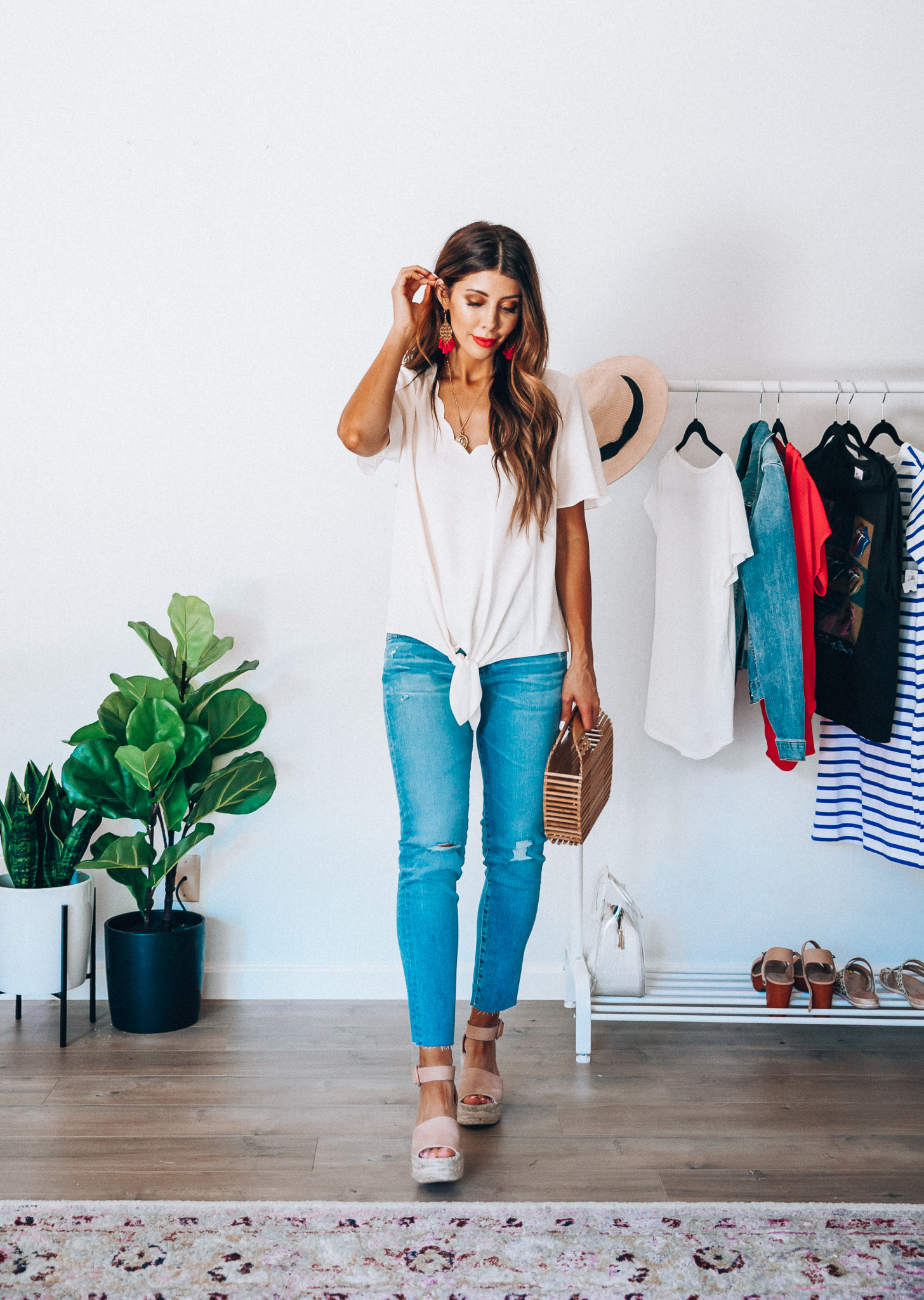 Summer Try On: Evereve Favorites by popular San Francisco fashion blog, The Girl in the Yellow Dress: image of a woman wearing a Evereve Allison Joy Lyla Scallop Trim Top, Evereve Thirty-Nine 42 Duncan Filigree Earrings, Evereve Ag Prima Crop jeans, Evereve Marc Fisher Alida Wedge Sandals, and holding a Shopbop Cult Gaia Small Gaia's Ark Bag.  