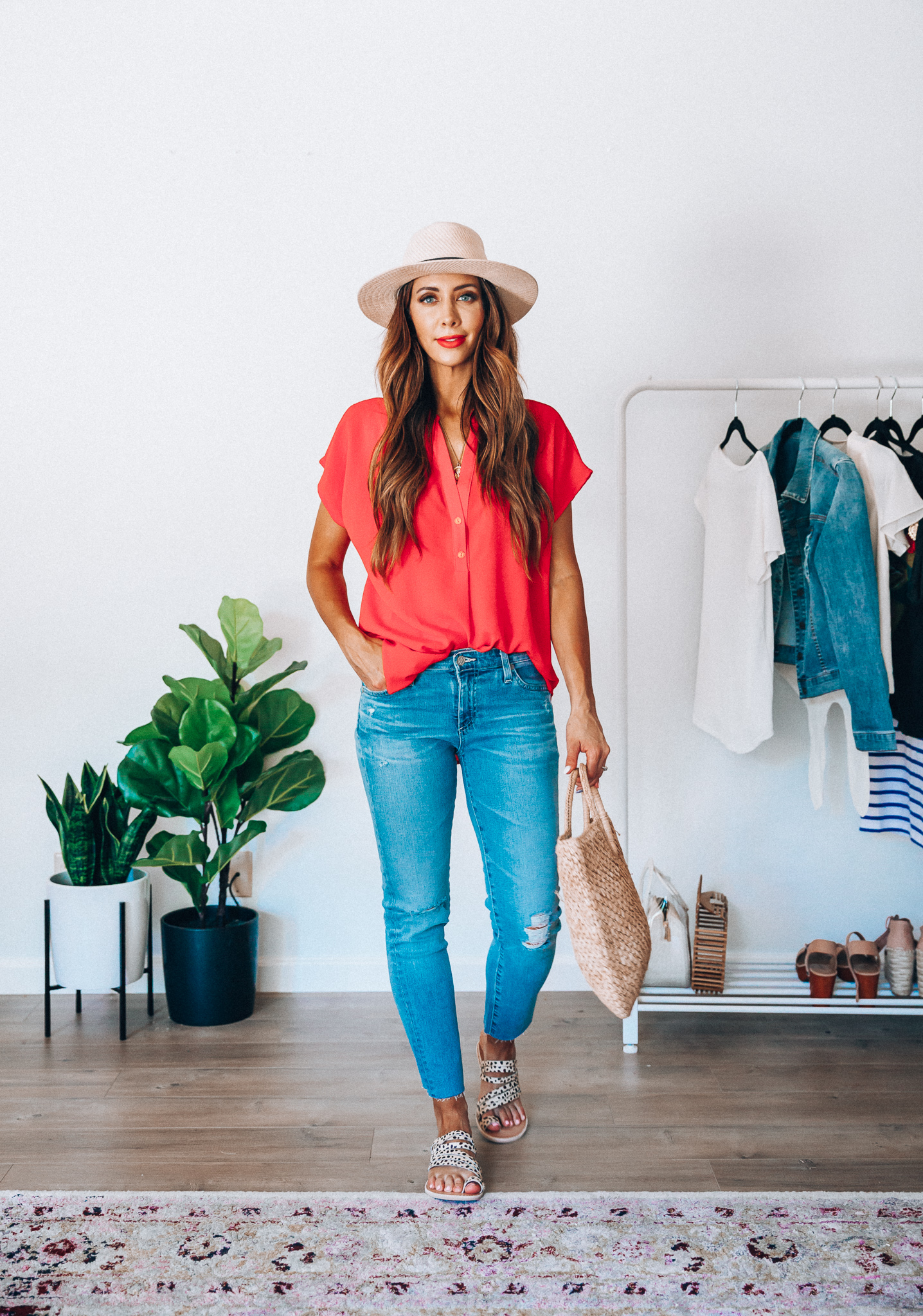 Summer Try On: Evereve Favorites by popular San Francisco fashion blog, The Girl in the Yellow Dress: image of a woman wearing a Evereve red Allison Joy Amelia Popover Top, Evereve Ag Prima Crop jeans, Evereve Dolce Vita Nelly Leopard Slide, Nordstrom Panama Hat by SOLE SOCIETY, and holding a Shopbop Hat Attack Small Round Handle Bag. 