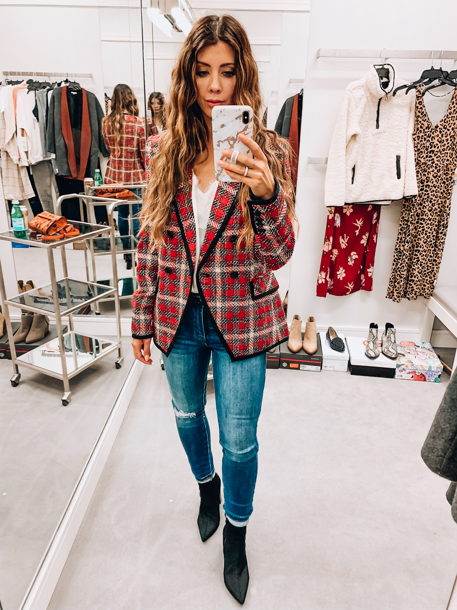 Nordstrom Anniversary Sale Early Access! by popular San Francisco fashion blog, The Girl in the Yellow Dress: image of a woman standing inside a Nordstrom dressing room wearing a Veronica Beard Harriet Cutaway Blazer, BP. Lace Trim Satin Camisole Top, Frame Le High Waist Skinny Jeans, and Jeffrey Campbell Raven Bootie. 