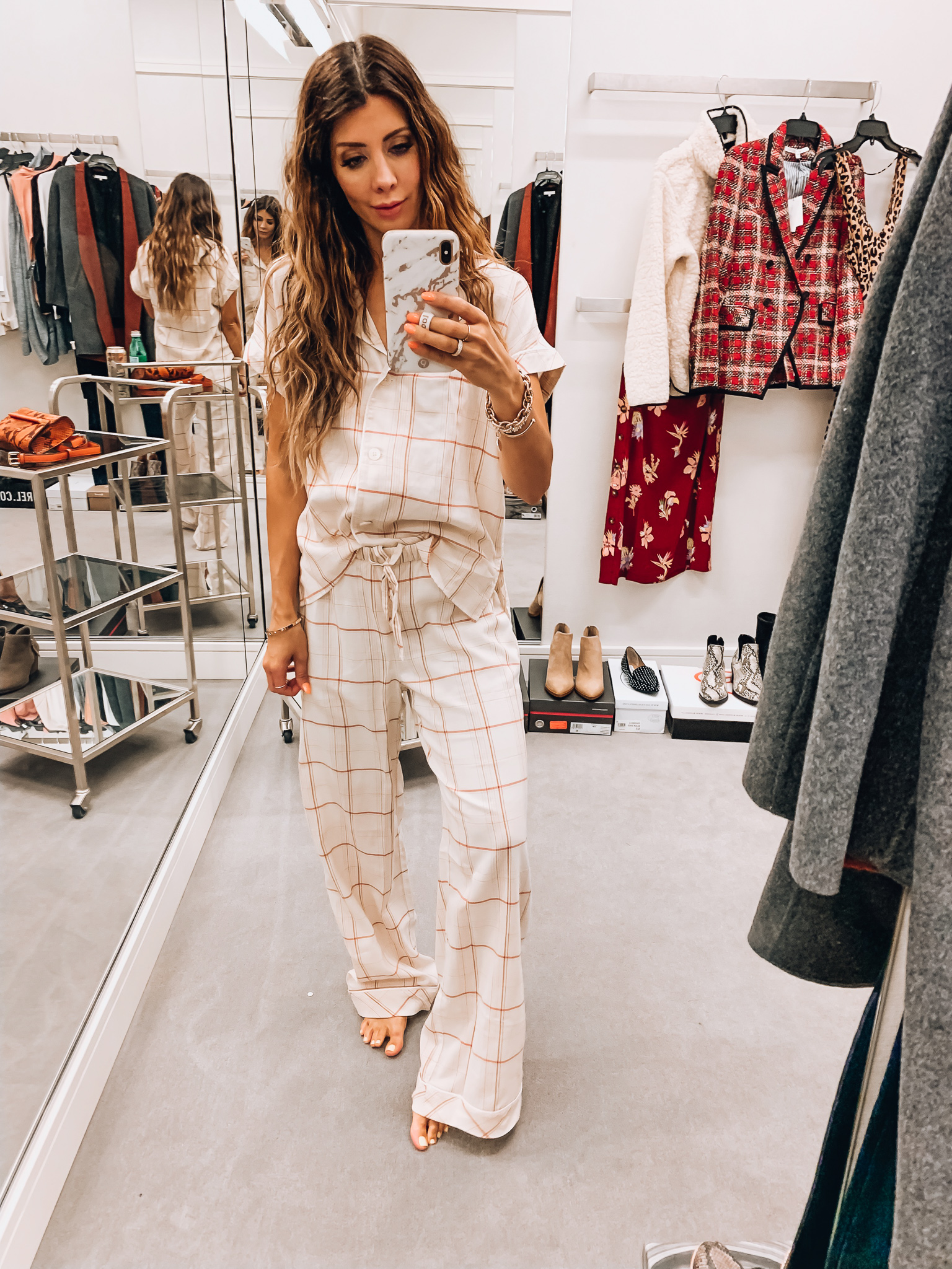 Nordstrom Anniversary Sale Early Access! by popular San Francisco fashion blog, The Girl in the Yellow Dress: image of a woman standing inside a Nordstrom dressing room wearing Madewell Fine Plaid Bedtime Pajamas