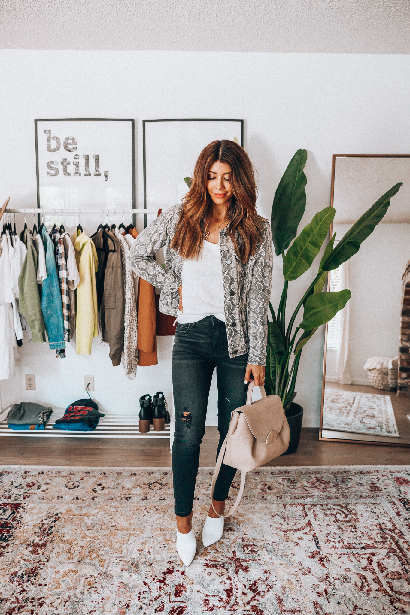 All Things Snakeskin Print by popular San Francisco fashion blog, The Girl in the Yellow Dress: image of a woman wearing snakeskin print jacket.