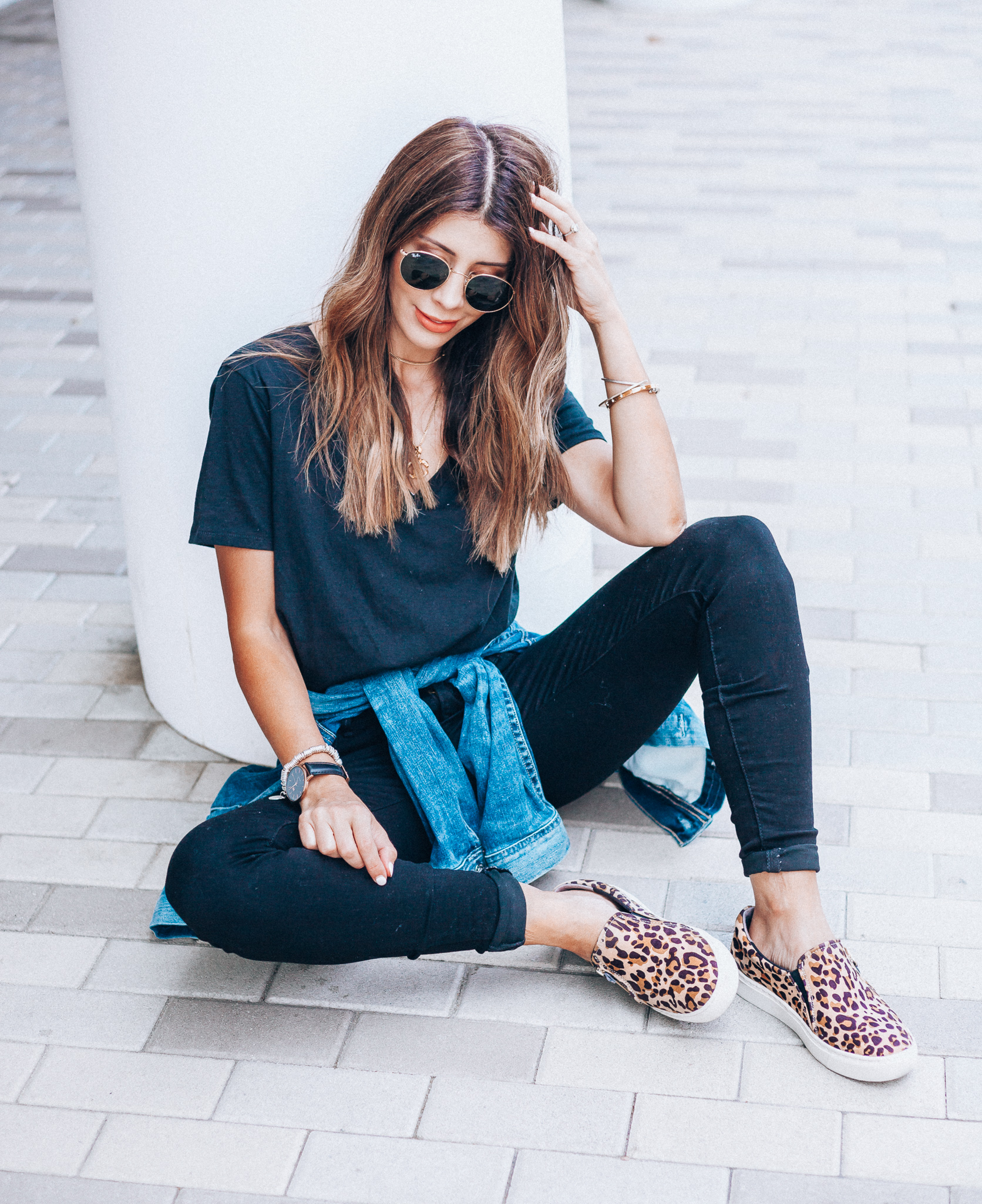 Casual Fall Outfits You'll Wear on Repeat by popular San Francisco fashion blog, The Girl in the Yellow Dress: image of a woman outside wearing a BP V-Neck Tee, Topshop Jamie High Waist Black Jeans, DR. SCHOLL'S NO CHILL PLATFORM SLIP-ON SNEAKER, Evereve Ag Mya Denim Jacket, and Icons 53mm Retro Sunglasses RAY-BAN.