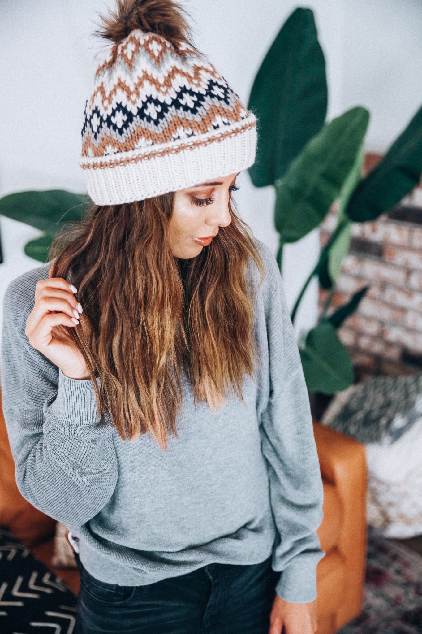 Go-To Fall Hats by popular San Francisco fashion blog, The Girl in the Yellow Dress: image of a woman wearing a patterned beanie. 