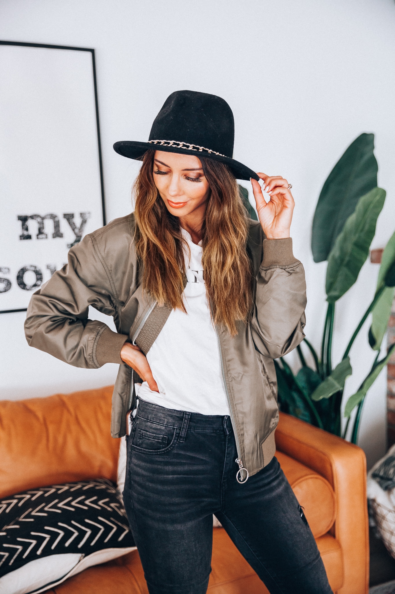 Go-To Fall Hats by popular San Francisco fashion blog, The Girl in the Yellow Dress: image of a woman wearing a Something Navy Braided Trim Felted Wool Panama Hat.