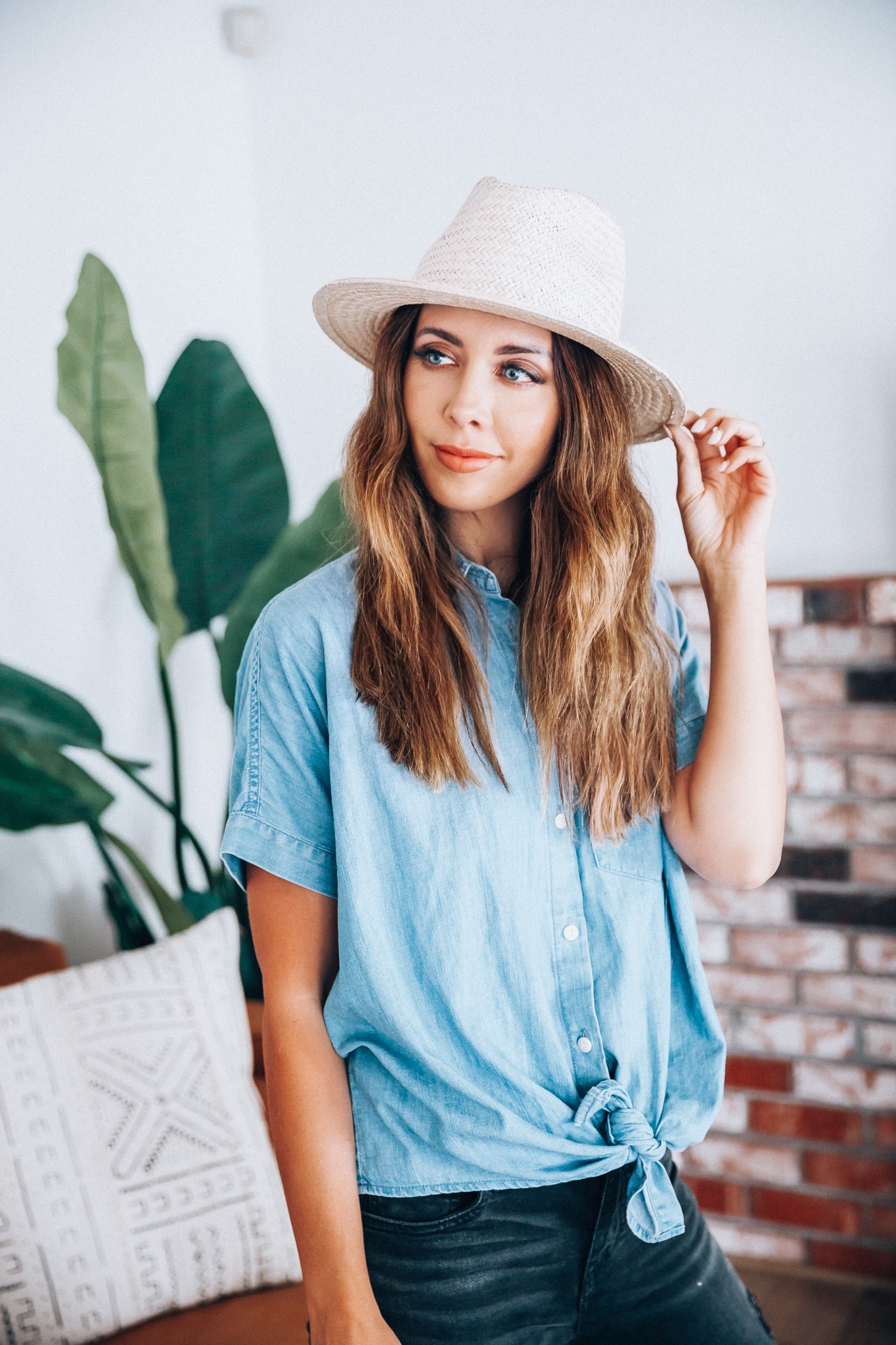 Go-To Fall Hats by popular San Francisco fashion blog, The Girl in the Yellow Dress: image of a woman wearing a Brixton Lera II Straw Fedora.