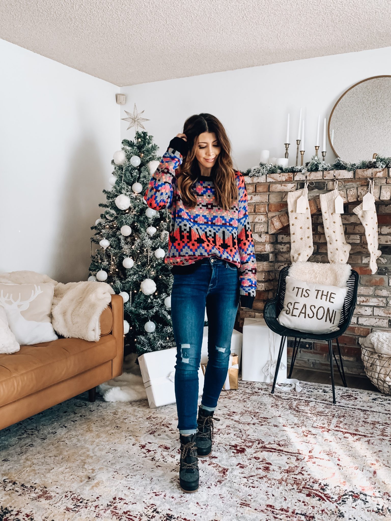 TRENDSEND BY EVEREVE by popular San Francisco fashion blog, The Girl in the Yellow Dress: image of a woman a Evereve Allison Joy Gracie Multicolor Sweater, Evereve Frame Le High Skinny, and Sorel Blake Lace Up Bootie.