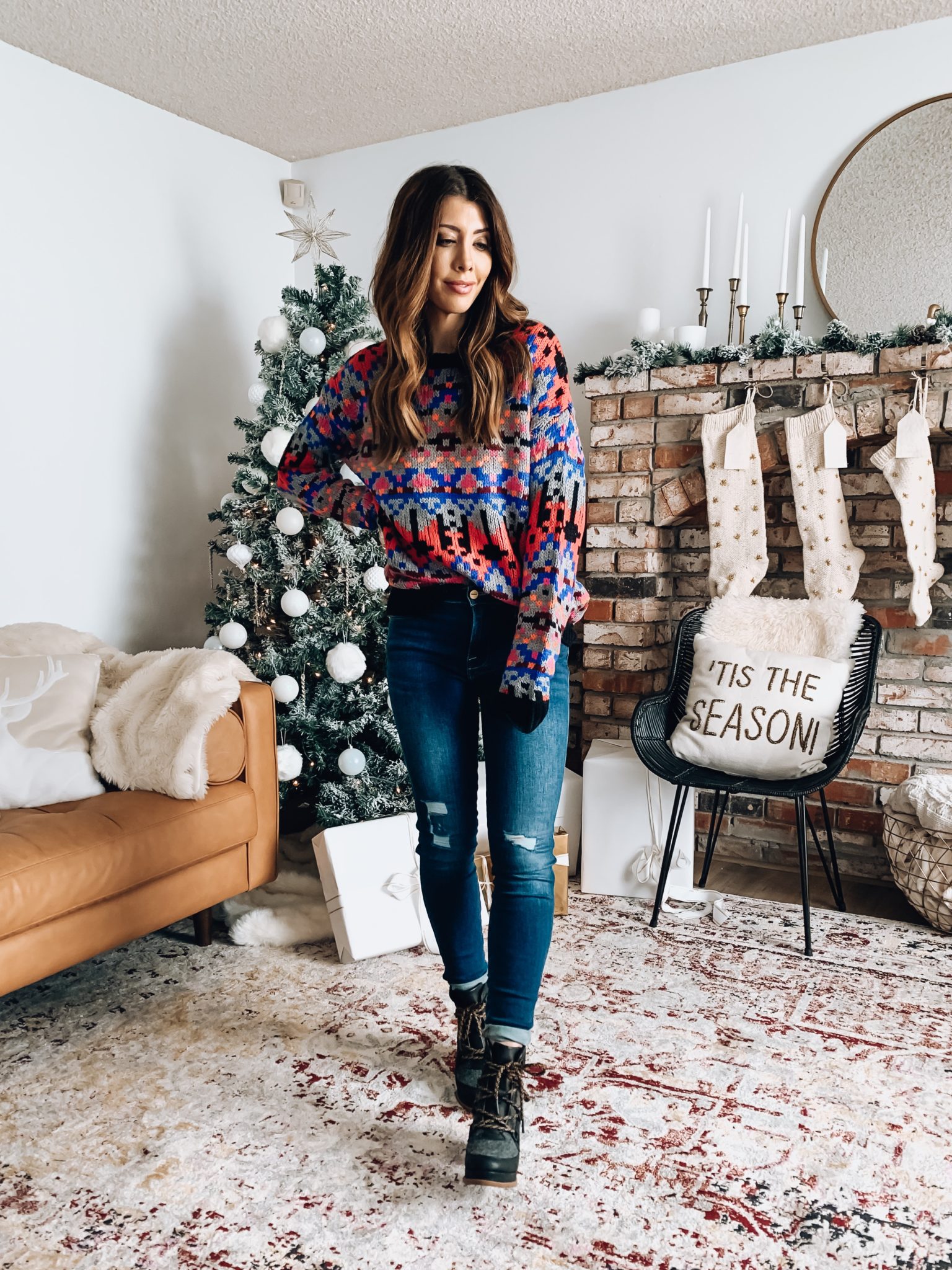 TRENDSEND BY EVEREVE by popular San Francisco fashion blog, The Girl in the Yellow Dress: image of a woman a Evereve Allison Joy Gracie Multicolor Sweater, Evereve Frame Le High Skinny, and Sorel Blake Lace Up Bootie.