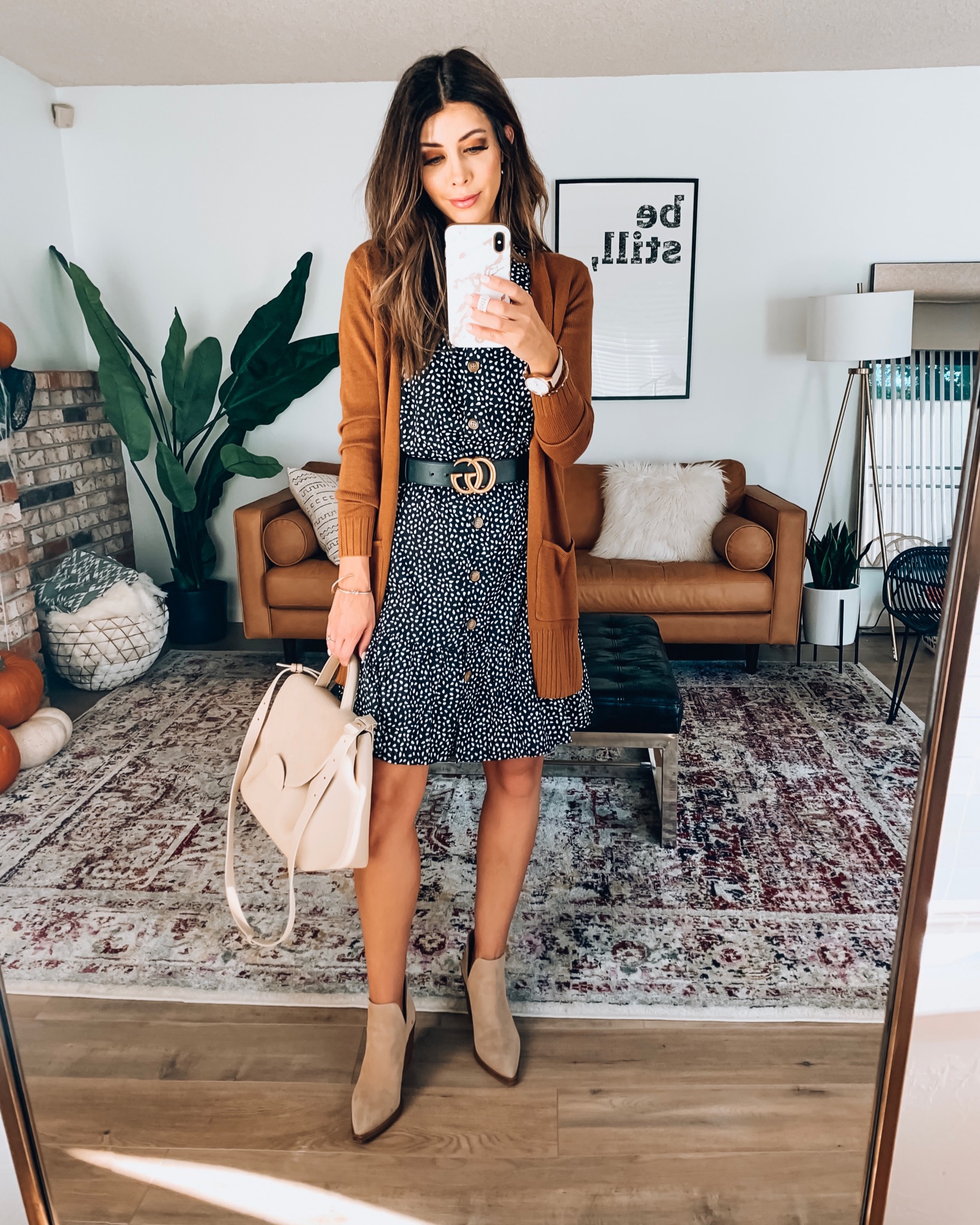 My 2019 Best Sellers by popular San Francisco fashion blog, The Girl in the Yellow Dress: image of a woman wearing a Amazon CHOiES record your inspired fashion Women's Polka Dot Button Down Ruffle Mini Dress.